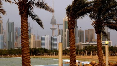 Kuwait city skyline is seen through the haze of a sand storm in Shuwaikh, Kuwait City. 
