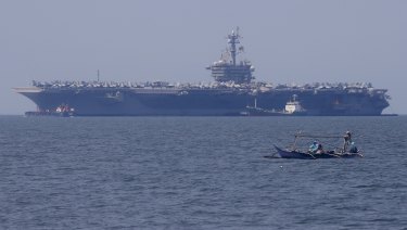 The USS Carl Vinson aircraft carrier at anchor off Manila, Philippines. 