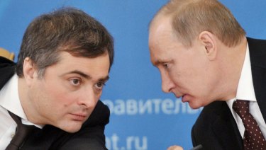 Russian Prime Minister Vladimir Putin, right, speaks to Vladislav Surkov, in 2012. 
