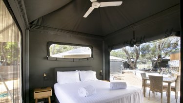 Each glamping tent comes standard with spacious ensuites, fans and private outdoor decks plus access to a range of handy services to enhance your stay at the eco-resort.