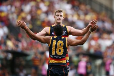 Happier days: Eddie Betts and Josh Jenkins were key members of the Crows’ attack during their grand-final run.