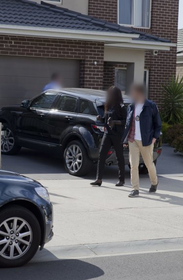 Police conduct inquiries at a property in Melbourne. 