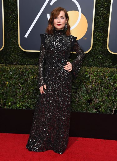 Isabelle Huppert arrives at the 75th annual Golden Globe Award.