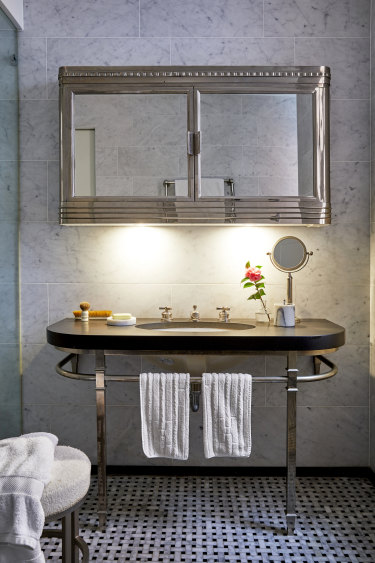 The bathroom is furnished with pieces from Sydney, Paris and New York. “The medicine cabinet was the inspiration; I picked up the rest from there,” says Mark.
