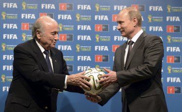 Russia’s President Vladimir Putin, right, and then FIFA President Sepp Blatter in July 2014.