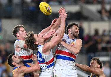 Marcus Bontempelli flies for a  mark during the match.