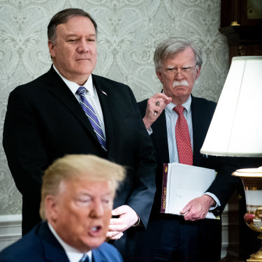 Secretary of State Mike Pompeo, left, and John R. Bolton, the national security adviser, had differing views on the peace plan.