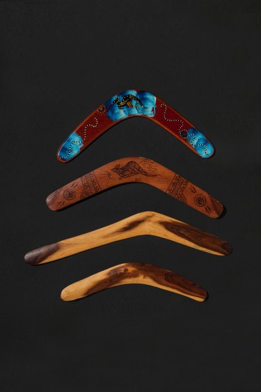 The top two boomerangs of are the fake type commonly sold in souvenir stores around Australia. The bottom two are genuine boomerangs, by Rolley Mintuma at Maruku Arts, NT.