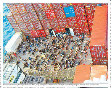 “The Tampa’s human cargo, photographed by the crew.” From the Sydney Morning Herald, August 29, 2001. 