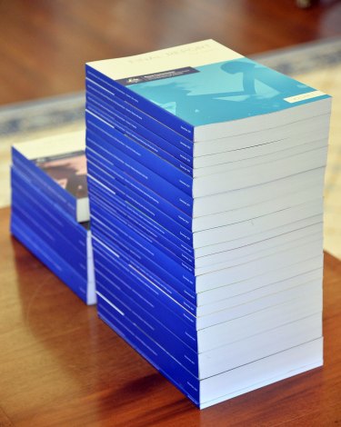 The 17 volumes of the royal commission's final report.