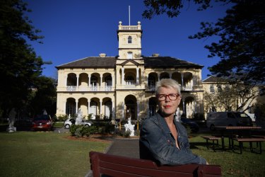 Greens councillor Elaine Keenan in front of the building called Edina in the grounds of the War Memorial Hospital in Waverley.