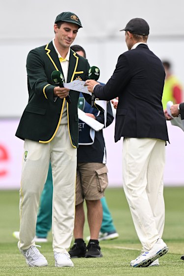 Joe Root and Pat Cummins at the toss. 