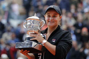 Jubilant: Australia's Ashleigh Barty holds the trophy. 