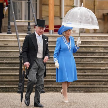Prince Charles and Camilla arrive at the Royal Garden Party at Buckingham Palace on May 11.