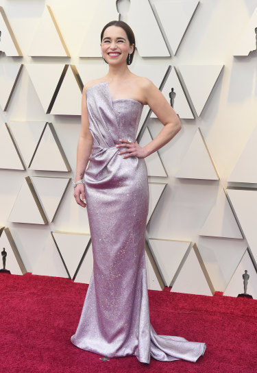 Emilia Clarke shows off her new hairstyle on the Oscars red carpet.