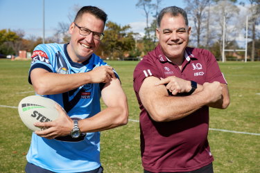 Minister for the Pacific Zed Seselja with football great Mal Meninga promoting vaccine take-up in PNG.