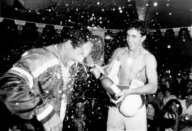 Jeff Fenech celebrates with Con Spiropoulos at the Marrickville Hotel. This was the image used in the paper.
