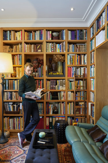 Mark in the study which houses Warren’s reference library. The Giacometti-style lamp is from Galerie Chastel-Maréchal, Paris, and the sofa from Tyrone Dearing.