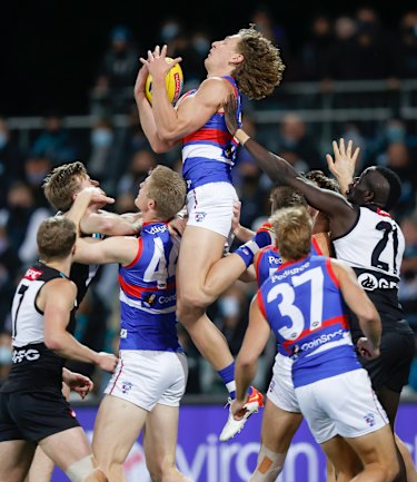 Aaron Naughton flies for a mark.