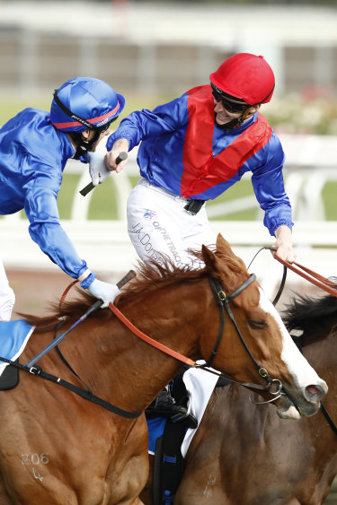 James McDonald (right) after taking Zaaki to victory.