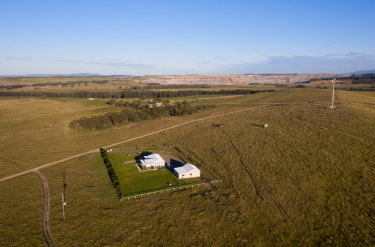 Houses in Camberwell in the Hunter Valley are surrounded by coal mines.