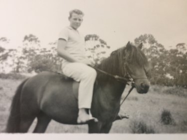 A young Ray Hawke on a horse at Narrabundah circa 1956.