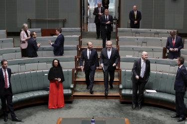Josh Frydenberg and Scott Morrison enter the House of Representatives ahead of passing the government's $130 billion JobKeeper wage subsidy package.