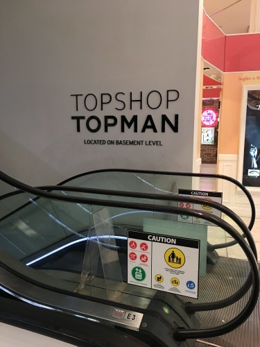 Going down ... Signs to the escalators leading to the former Topshop and Topman departments at Myer Melbourne.