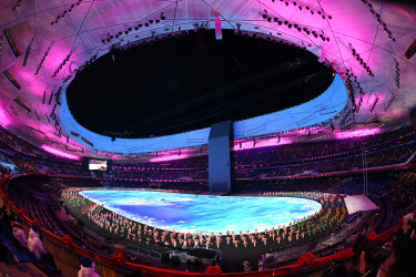 General view inside the stadium as performers dance during the Opening Ceremony.