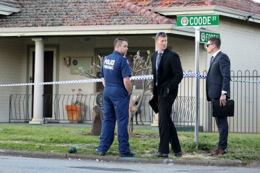 Police are seen outside a property in Coode Street in the Perth suburb of Bedford.