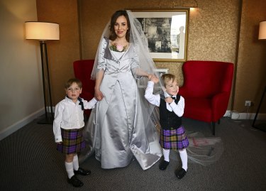 Stella Moris is photographed in her Vivienne Westwood dress, with her sons Max, 3, and Gabriel, 4, before driving to Belmarsh Prison to marry Assange.