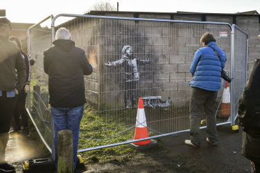 Banksy Mural On Garage In Wales Sells For Six-figure Sum