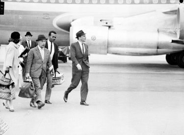 US singer Frank Sinatra arrives at Mascot Airport in Sydney on November 29, 1961