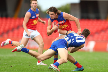 Fighting fit: Jarrod Berry looks to shrug off a tackle.