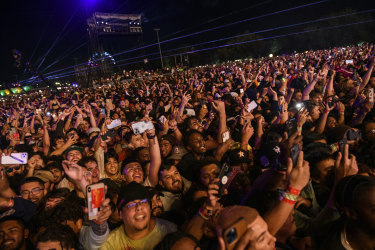 The crowd watches as Travis Scott performs at Astroworld Festival at NRG park on Friday night. 