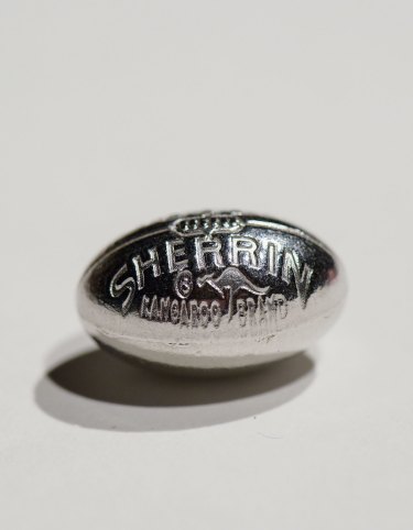 The player tokens for Melbourne Monopoly include a tram, a miniature Par Lap and this football. 
