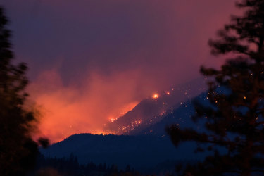 A wildfire near Lytton in Canadaâ€™s British Columbia in early July. The town recorded 49.6 degrees in late June, smashing the nationâ€™s previous record temperature by a shocking five degrees.