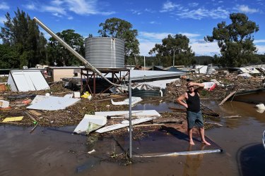 Brad McCutcheon, a resident of St George Caravan Park, surveys the scene during flooding of the Hawkesbury River near Sydney in March 2021.