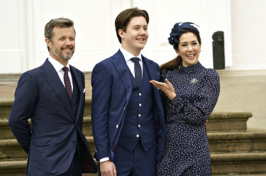 Denmark’s Crown Prince Frederik and Princess Mary, pictured in 2021, pulled their son, Prince Christian, centre, out of his prestigious boarding school in June when it was rocked by a bullying scandal. 