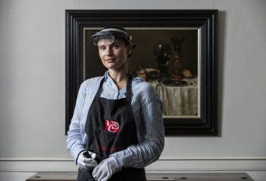 Art conservator Claire Heasman pictured with the Woodford still life, a 17th-century painting unearthed in the Blue Mountains that may be worth up to $5 million.