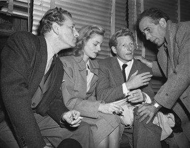  Celebrities including Lauren Bacall (second from left) and Humphrey Bogart (right) flew to Washington in 1947 to protest the American co<em></em>ngressional committee that was then persecuting communists in Hollywood.