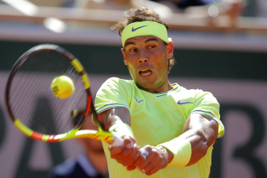 Spain's Rafael Nadal plays a shot against Belgium's David Goffin during their third round match.