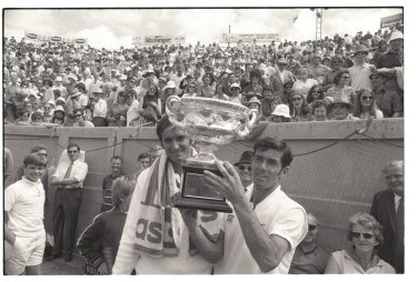 Ken Rosewall, watched by runner-up Mal Anderson, celebrates his win on January 3, 1972