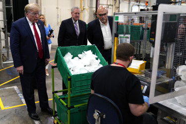 President Donald Trump tours an N95 mask manufacturing plant in Phoenix, Arizona.