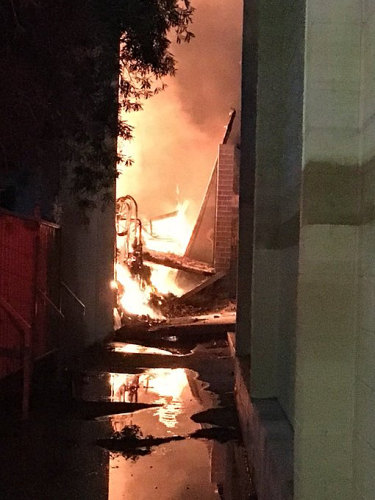 Scenes from the Alexandria warehouse fire in 2018.