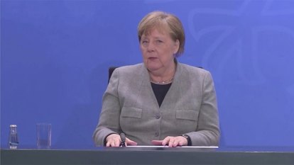 As Germany's curve flattens, Merkel warns caution