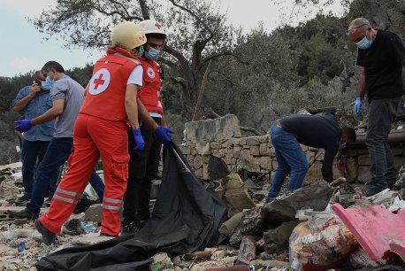 An Israeli strike on a home in the village of Aitou has killed more than 20 people, with claims it was targeting a Hezbollah official visiting the residence. Matthew Knott and Kate Geraghty are in Lebanon.