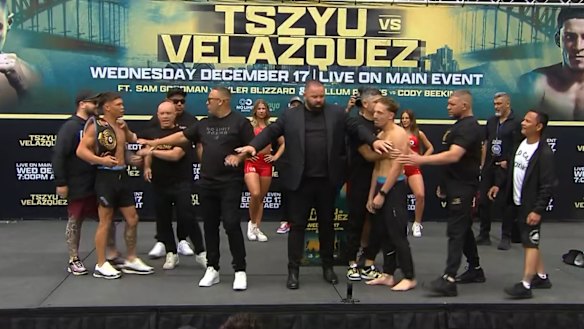 Tempers flare as the undercards weigh in, as Jason Fawcett slaps Marco Romeo.