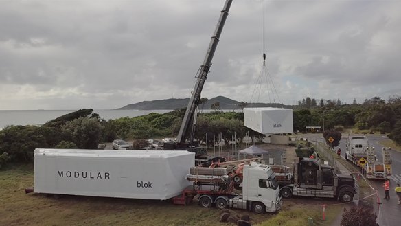 Drone footage of Blok Belongil, a triangular shaped beach house for a triangular shaped site at Byron Bay, going up in a day. A modular design, by architects Blok Modular with Vokes and Peters ,it was made in a QLD factory, and shipped to the site by truck. It is shortlisted for the NSW Architecture awards for best new home to be announced in late June.