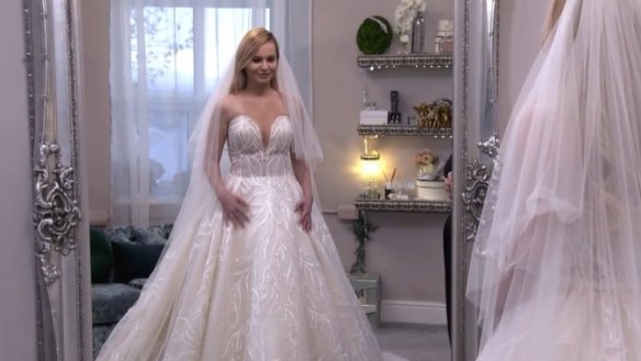 Emily and her mum love a giant princess gown, but her stepmum Trina brutally shares a different opinion on Say Yes To The Dress: Lancashire.